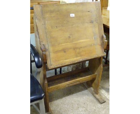 An Arts and Crafts oak Cotswold School metamorphic easel/desk