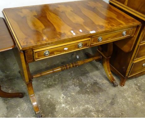 A reproduction yewwood sofa table, with 2 frieze drawers, raised on lyre end supports, length 91cm