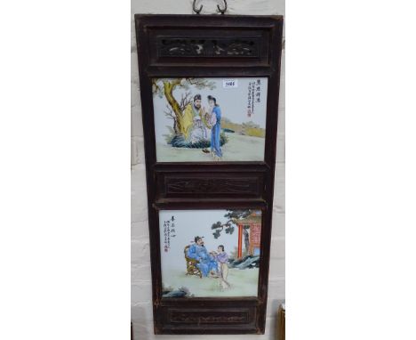 A pair of framed Chinese painted ceramic panels, length 94cm