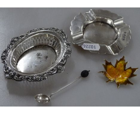 A silver ashtray, a pierced and embossed silver dish, a silver bean-end coffee spoon, 2.8oz, and a Norwegian sterling silver 