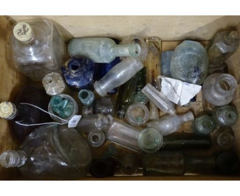 A pine box containing Vintage bottles