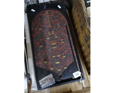 A bagatelle board circa 1930s