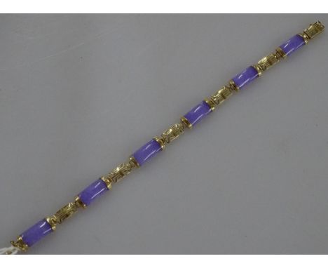 A Chinese 14ct gold bracelet, set with Lavender jade panels