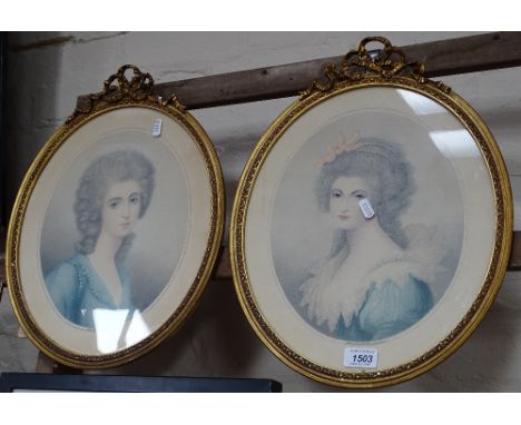 A pair of oval coloured engravings, portrait studies, gilt framed