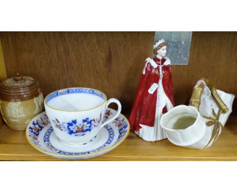 A Royal Worcester vase, a Royal Worcester Queen, a Minton cup and saucer and a Doulton tobacco jar