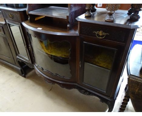 A late Victorian mahogany bow-front chiffonier, glazed cupboard doors on cabriole legs, length 138cm