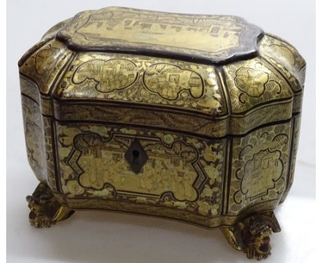 An ornate 19th century Chinese carved and gilded wood tea caddy on carved feet, length 6.5"