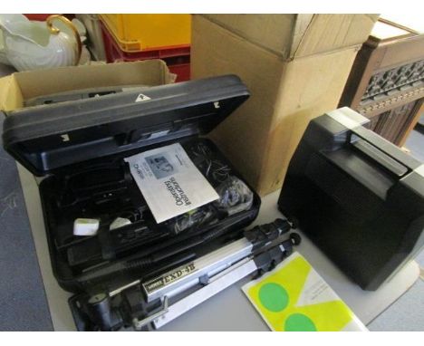 A Panasonic VHS C movie camera, a Chinon Dual 8mm projector, a Supersound projector Super 8 and a model EXD-4B tripod 