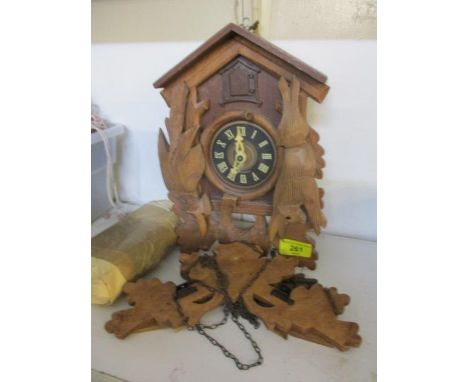 A Black Forest carved cuckoo clock 