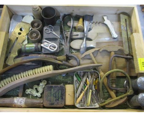 An interesting early 20th century lot comprising treen butter pats, useful household tools, scissors, corkscrews and other it