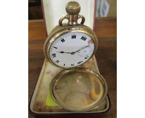 An early 20th century manual wind Hunter pocket watch with white enamelled Roman dial, off set seconds to 6, in a Dennison St