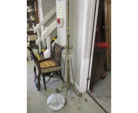 A Victorian brass standard lamp, together with three light fittings 
