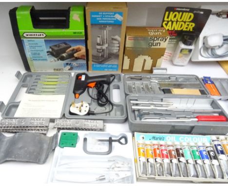 Modelling tools and materials clamps, spray gun, glue gun, miniature drill, knife and tool set, moulding metal, glass engravi