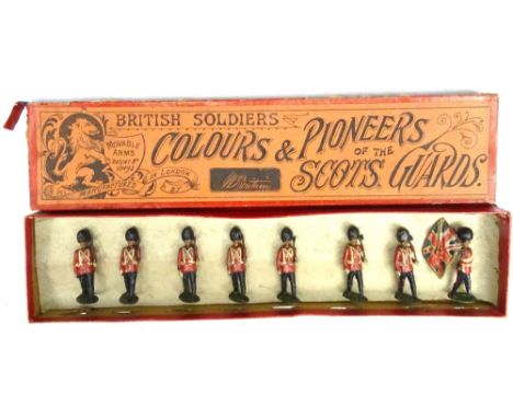 Britains set 82, Colours and Pioneers of the Scots Guards FIRST VERSION, valise packs, with wasp-waisted Colour Bearer, in or