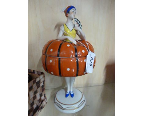 VINTAGE POWDER BOWL/TRINKET BOX,ART DECO LADY ON LEGS,APPROX 8" TALL (WITH PUMPKIN ORANGE SKIRT)