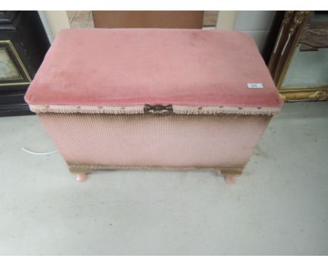 A vintage woven fibre ottoman, approx. width 62cm