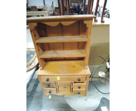 A vintage pine specimen or dolls dresser, approx. dimensions 29cm x 47cm