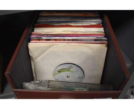 A case of approx. 75 vinyl singles including Mott the Hoople, The Stranglers, Whitesnake, The Who, Dire Straits and the Rolli