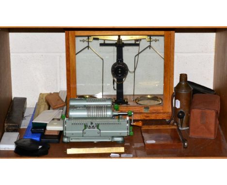 An oak cased precision balance, two cameras and a quantity of slide rules; an ADM calculator; a copper vessel; a Stanley 'All
