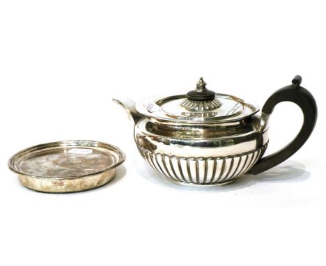 George III silver teapot, W B R S, London 1808, with matching circular stand, crest engraved to one side  