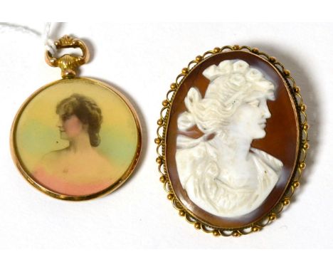 A 9ct gold framed shell cameo brooch and a portrait fob  Cameo - 4.5cm by 3.5cm, the cameo mount is stamped 9ct with a crack 