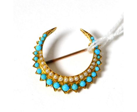 A Victorian turquoise and seed pearl crescent brooch, graduated round cut turquoise with an inner band of seed pearls, measur