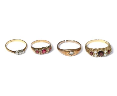 A 9 carat gold garnet and pearl ring, a 9 carat gold ruby and diamond ring and two diamond rings (4) Garnet and pearl ring - 