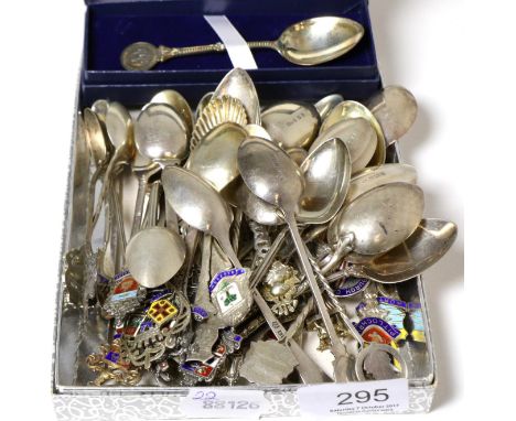 A large group of assorted silver souvenir spoons, various dates and makers, mostly UK, the majority with enamel terminals (qt