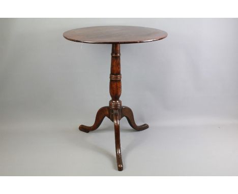 Antique Mahogany Circular Wine Table. The table on turned support with tripod feet, approx 51 cms dia.