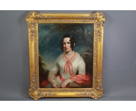 A 19th Century Oil on Canvas. Portrait of a Lady, half-length, approx 135 x 110 cms, presented in a decorative floral gilt wo