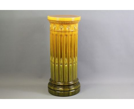 A Bretby Ceramic Umbrella Stand. The stand approx 28 dia x 62 cms, Bretby England stamped to base.
