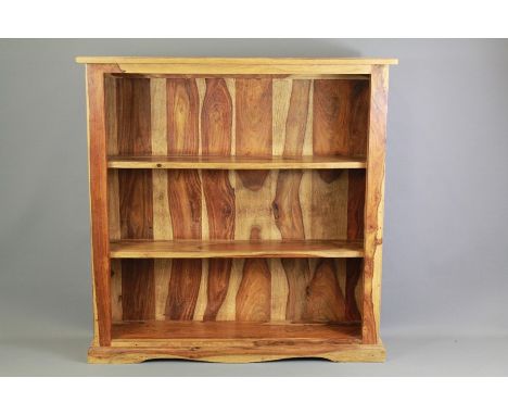 A New Zealand Wood Book Case. The two shelf book case being approx 90 x 24 x 90 cms.&nbsp;