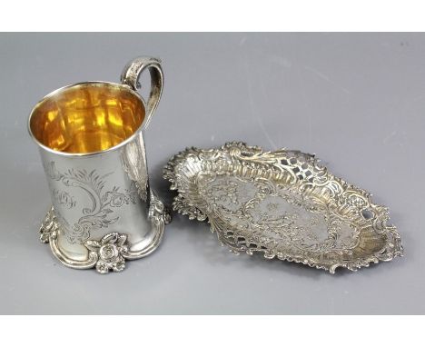 A Victorian Silver Christening Mug. The with foliate decoration monogram C.O.F, Sheffield hallmark, dated 1858, mm Henry Wilk