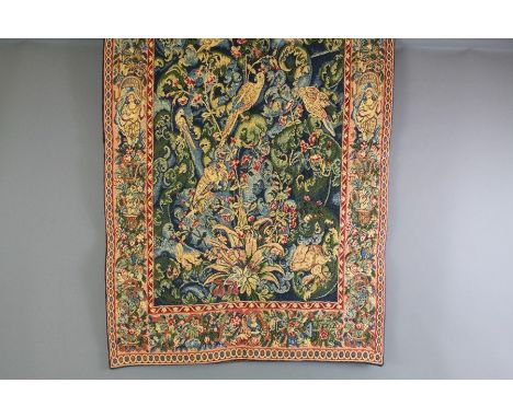 A Wall-Hanging Tapestry. The tapestry border depicting figures playing instruments, flowers and fruit, approx 68 x 104 cms.&n