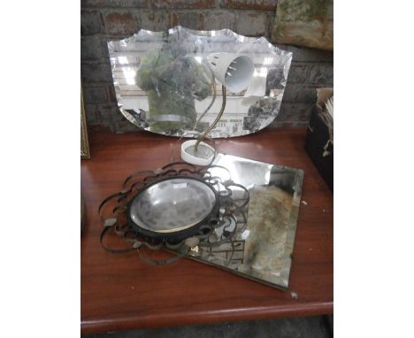 3 mirrors and a retro desk lamp