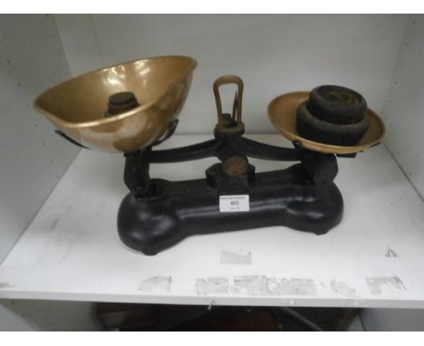 set of cast scales with brass pans