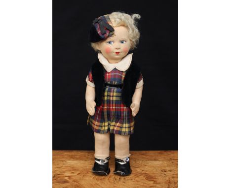 A 1940's Chad Valley cloth head and cloth jointed bodied doll, moulded face with painted features including blue eyes and red