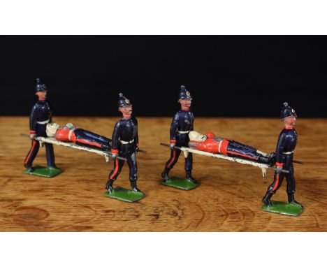 W Britain (Britains) Royal Army Medical Service figures, comprising two pairs of stretch bearers, each with wounded casualty 