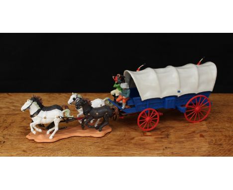 Britains Wild West Series No.7616 Pioneer covered wagon, comprising a four Horse team pulling a blue wagon with white canopy 
