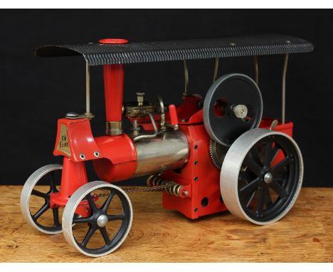 A Wilesco D40 live steam traction engine (Dampftraktor) "Old Smoky", red painted body with black canopy, mirror polished nick