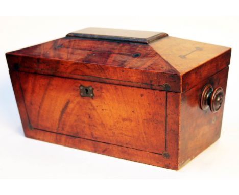 A Georgian mahogany sarcophagus shaped tea caddy. L33cm.Condition:  No signs of major damage or repair.  Brass inlay at front