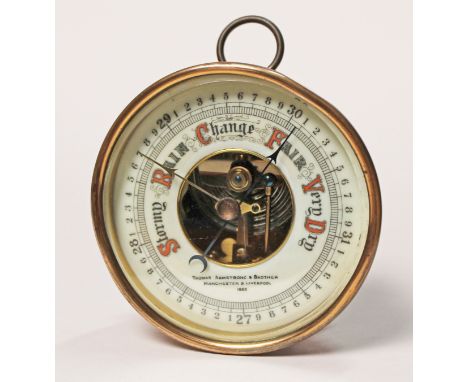 A brass holosteric barometer by Thomas Armstrong & Brother, Manchester, diam. 11cm. Condition - appears to be working correct