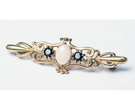 A 9ct gold opal sapphire brooch, length 4.3cm, gross wt. 2.7g.