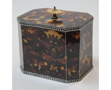 A faux tortoiseshell pewter tea caddy, inscribed "Craftsman Pewter", height 14cm.
