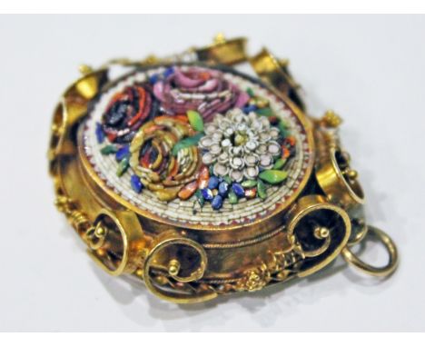 A 19th Century micro mosaic locket pendant having floral centre and fancy gold surround, length 3.7cm, gross wt. 10.2g. Condi