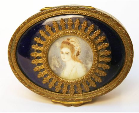 A French gilt metal and blue enamel box of oval form having applied miniature portrait on ivory to top, circa 1900, length 9.