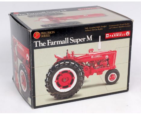 ERTL Precision Classics 1/16th scale model of a McCormick Farmall Super M Tractor, requires a clean, with medallion and leafl