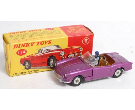 Dinky Toys, 114, Triumph Spitfire, metallic purple body with gold interior and seated driver figure, spun hubs, with lift off