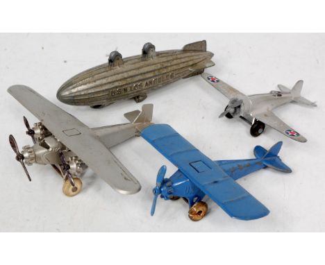 Collection of Tootsie Toys Aircraft, 4 examples to include Airship "USN Los Angeles" all silver, 2 metal rollers, US Army Air