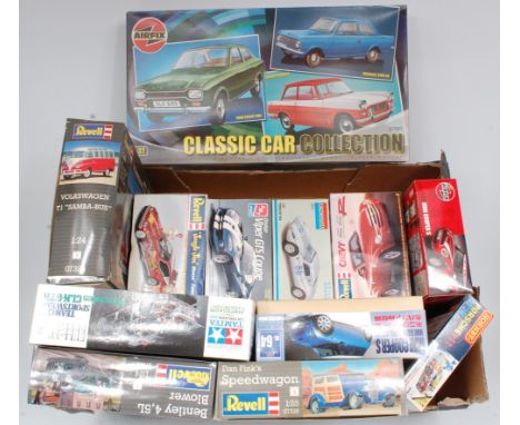 Revell, Airfix, Tamiya, Hornby, AMT, Monogram and other plastic kit group, 1/24th and 1/25th scales, 12 boxed as issued examp